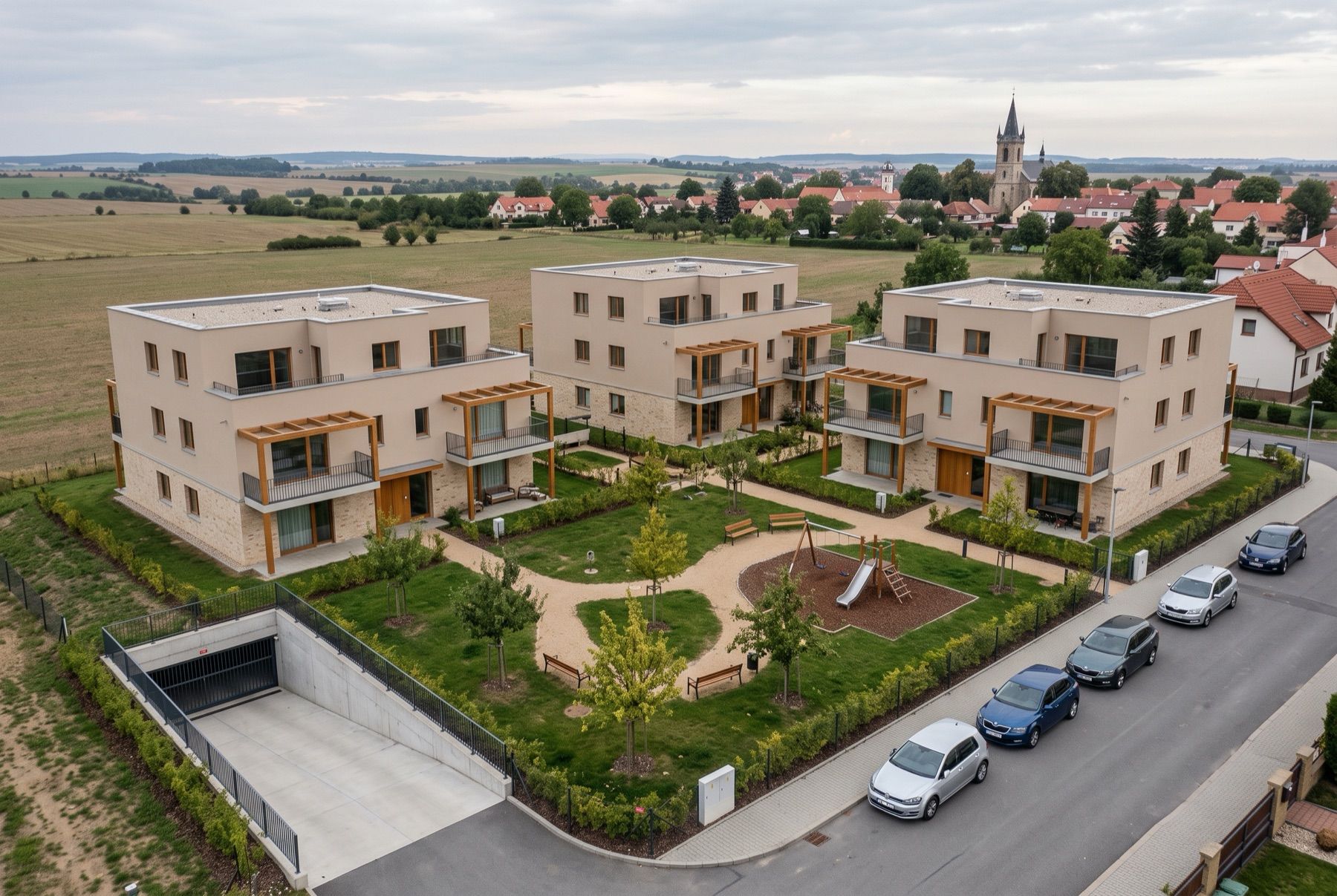 Vizualizace tří viladomů souboru Sady kolem společného dvora, letecký pohled